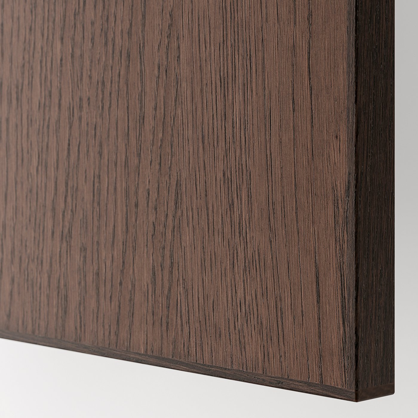Dark wooden drawer detail, smooth finish, visible grain texture, solid wood edging.