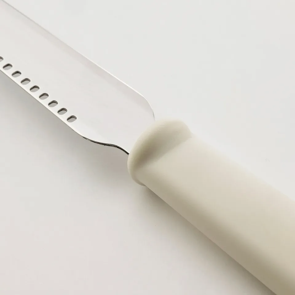 Stainless steel knife with white plastic handle, sharp edges, clean design.