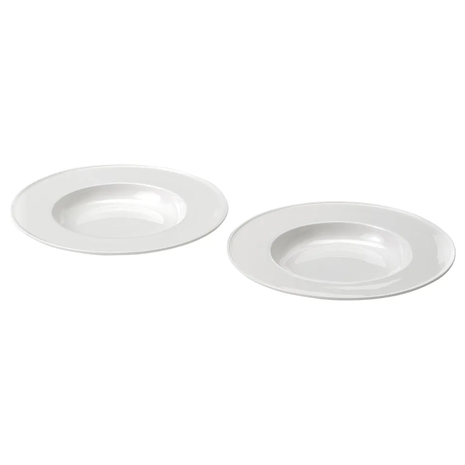 Two white elegant deep plates with flat rims, made of fine porcelain. Simple and timeless design, perfect for special occasions.