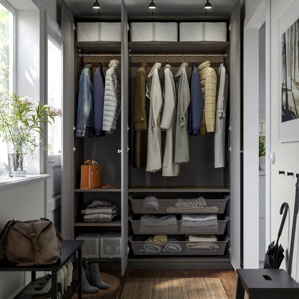 Well-organized closet with hangers, shelves, baskets, and shoe rack; adjustable height and dampened hinges.