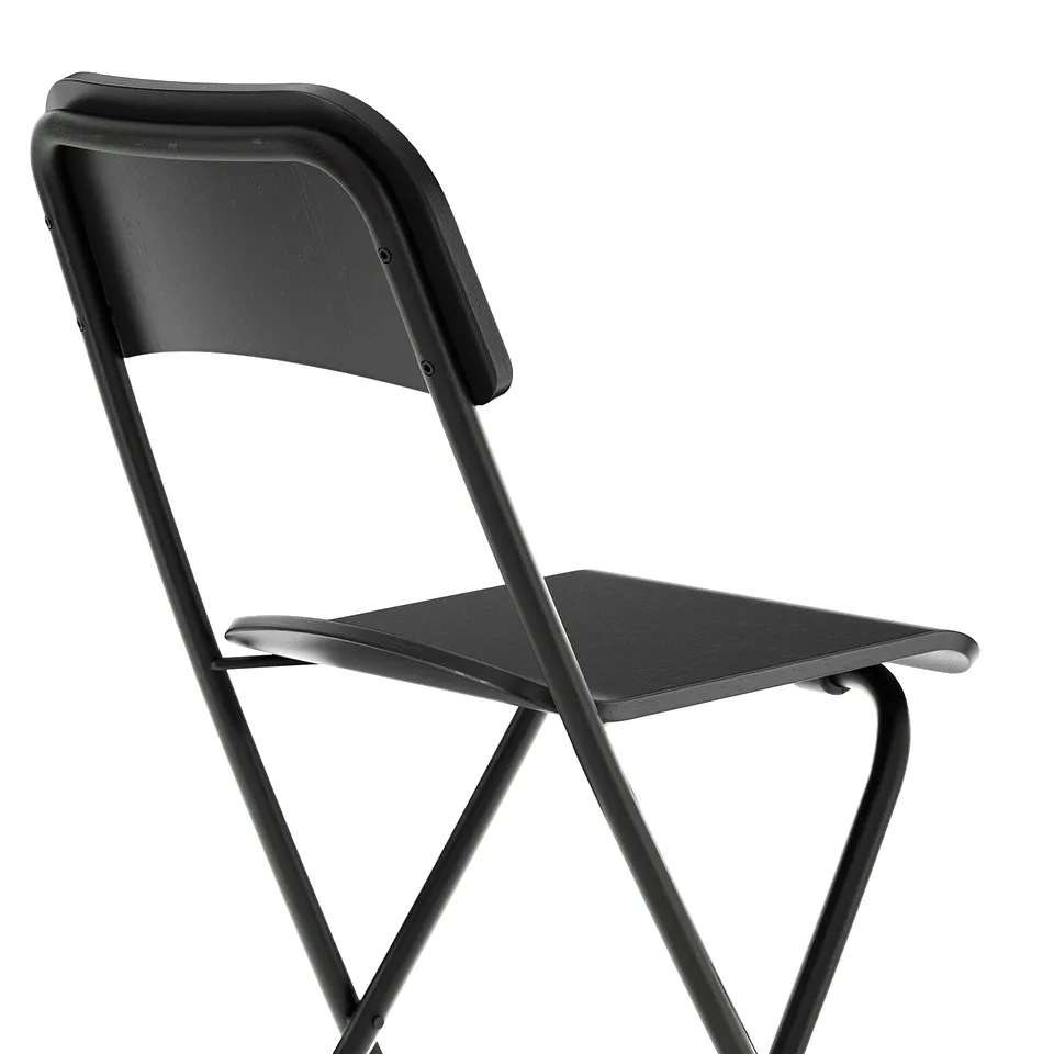 Black folding chair with metal frame and wooden seat. Designed for stability and easy storage.
