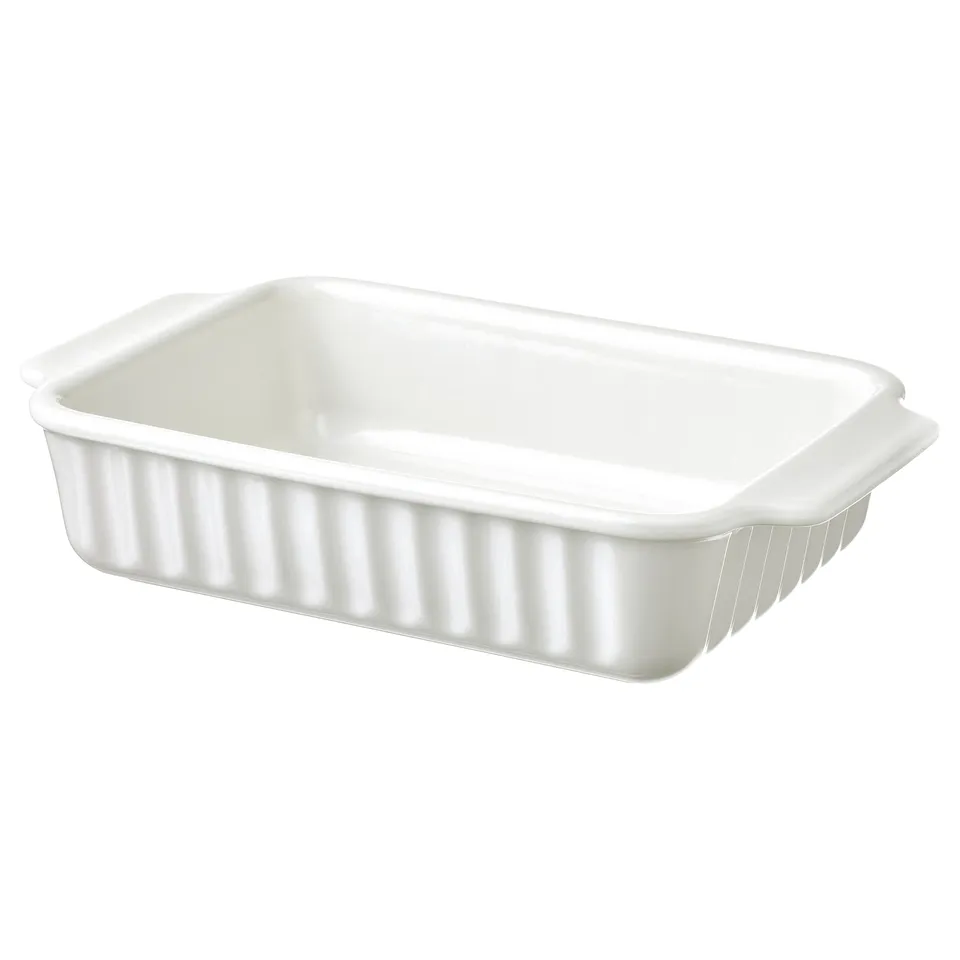 A white POETISK stoneware baking dish with handles and a ribbed design.