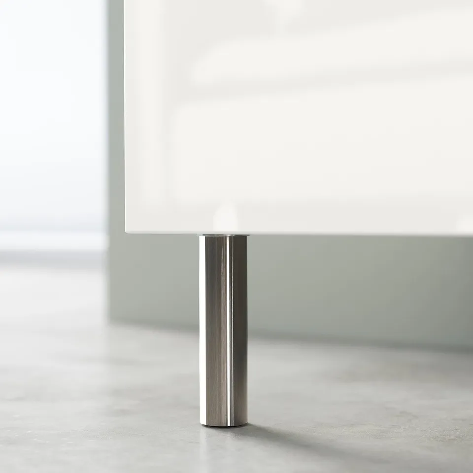 Single nickel-plated metal table leg for modern furniture.