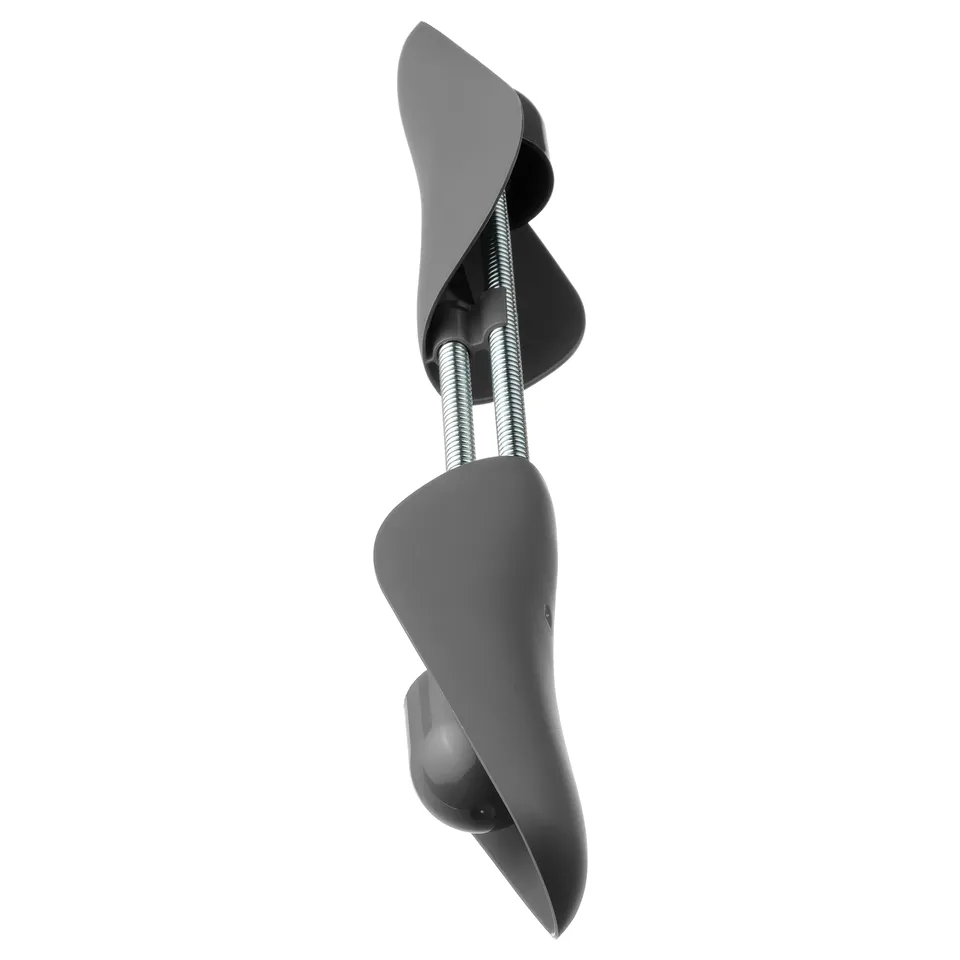 Adjustable grey shoe tree with spring, maintains shape.