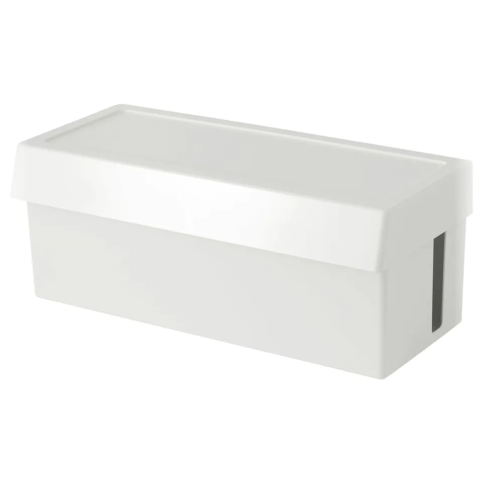 A white rectangular storage box, named SÄTTING, made of abs plastic, designed to hide cables and chargers.