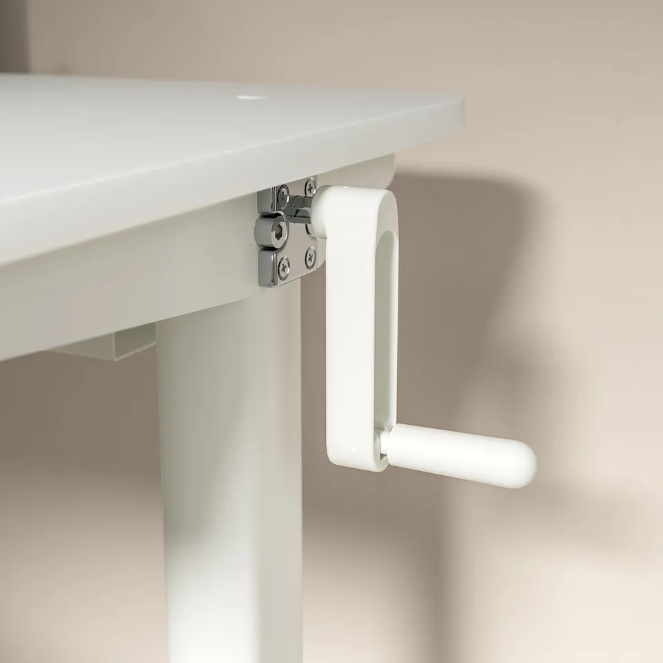 A white adjustable desk handle. It a crank mechanism for height adjustment.
