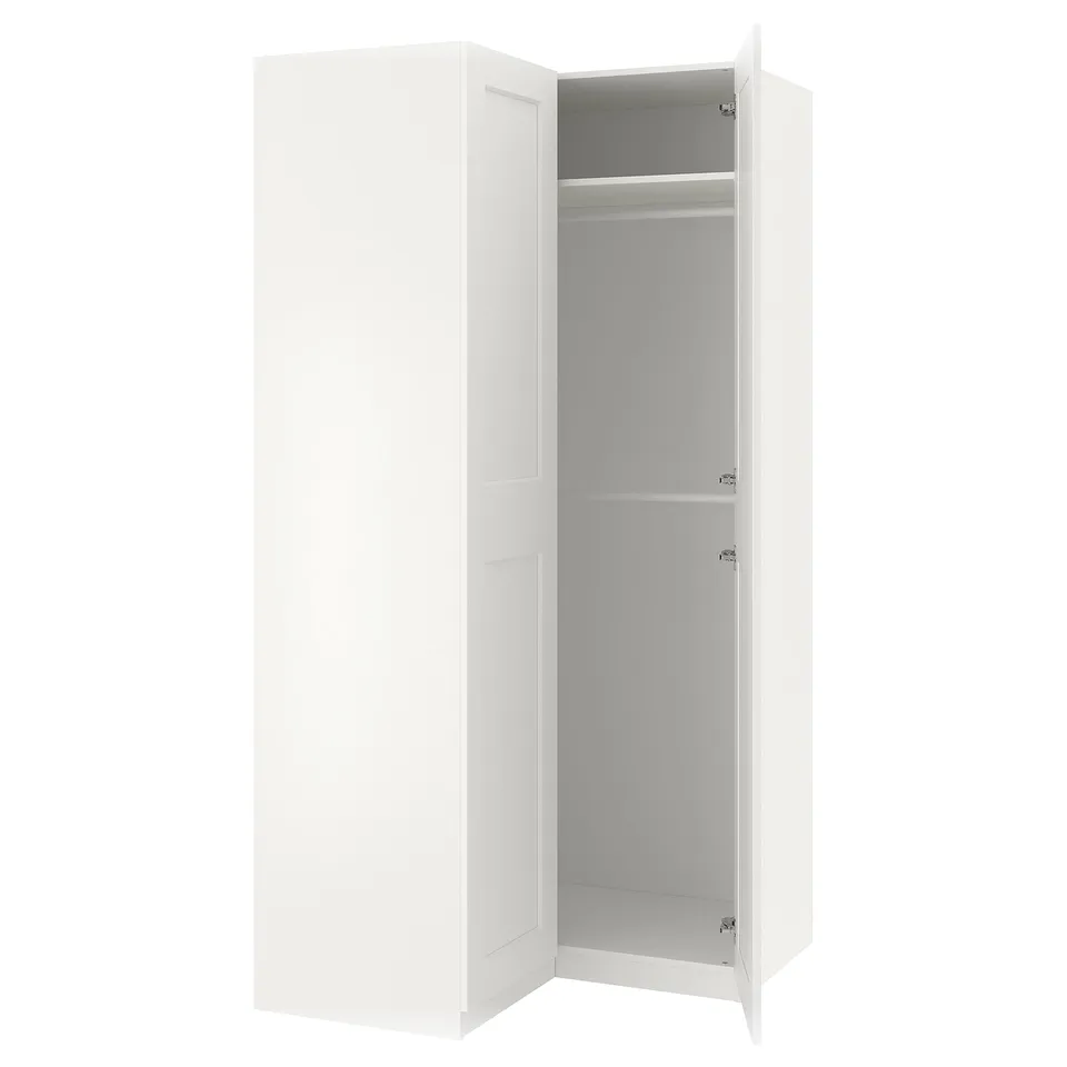 This image shows a white ikea PAX wardrobe with one door open, revealing empty shelves inside.