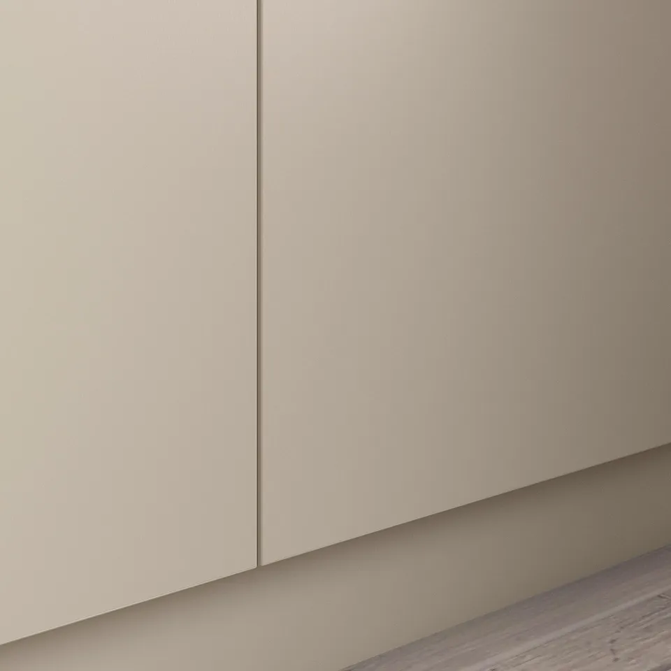 A beige PAX wardrobe with soft closing hinges.