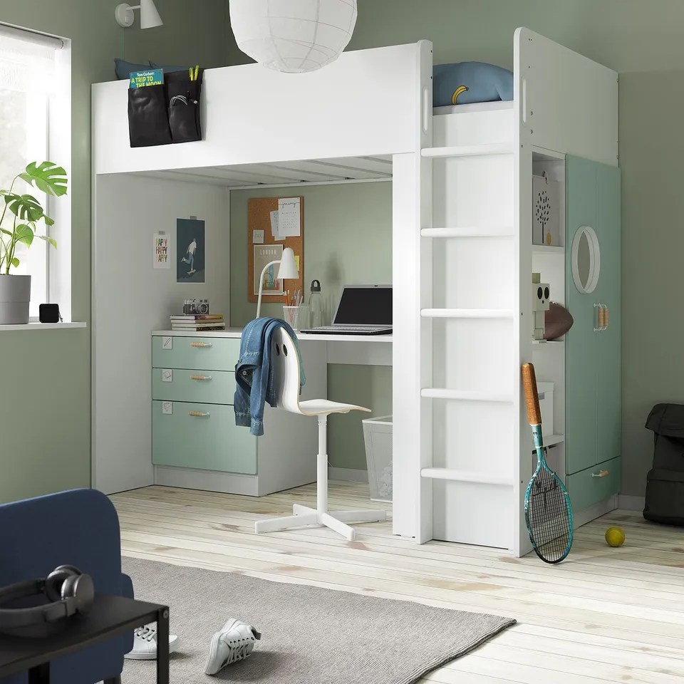 White SMÅSTAD loft bed with desk and storage, in green room. Maximises floor space efficiently.