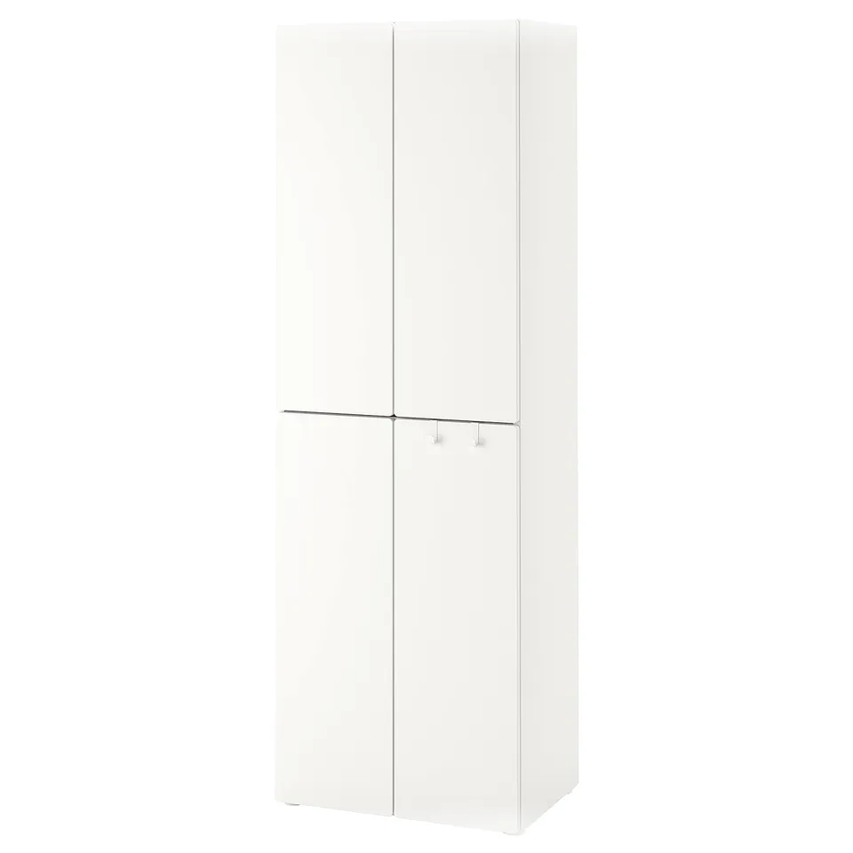 A white SMÅSTAD wardrobe, a tall storage unit with two doors, ideal for small spaces. It has a sleek, minimalist design.