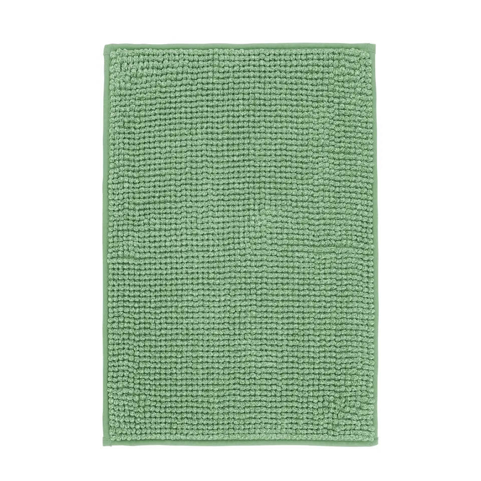 Green TOFTBO bath mat, rectangular, soft textured surface, recycled polyester, machine washable.
