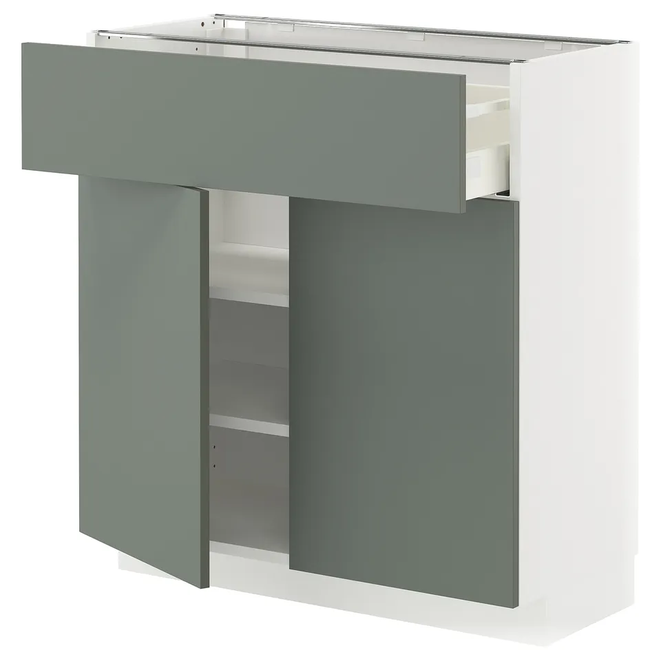Modern kitchen cabinet in grey-green with adjustable shelves and a clean design.