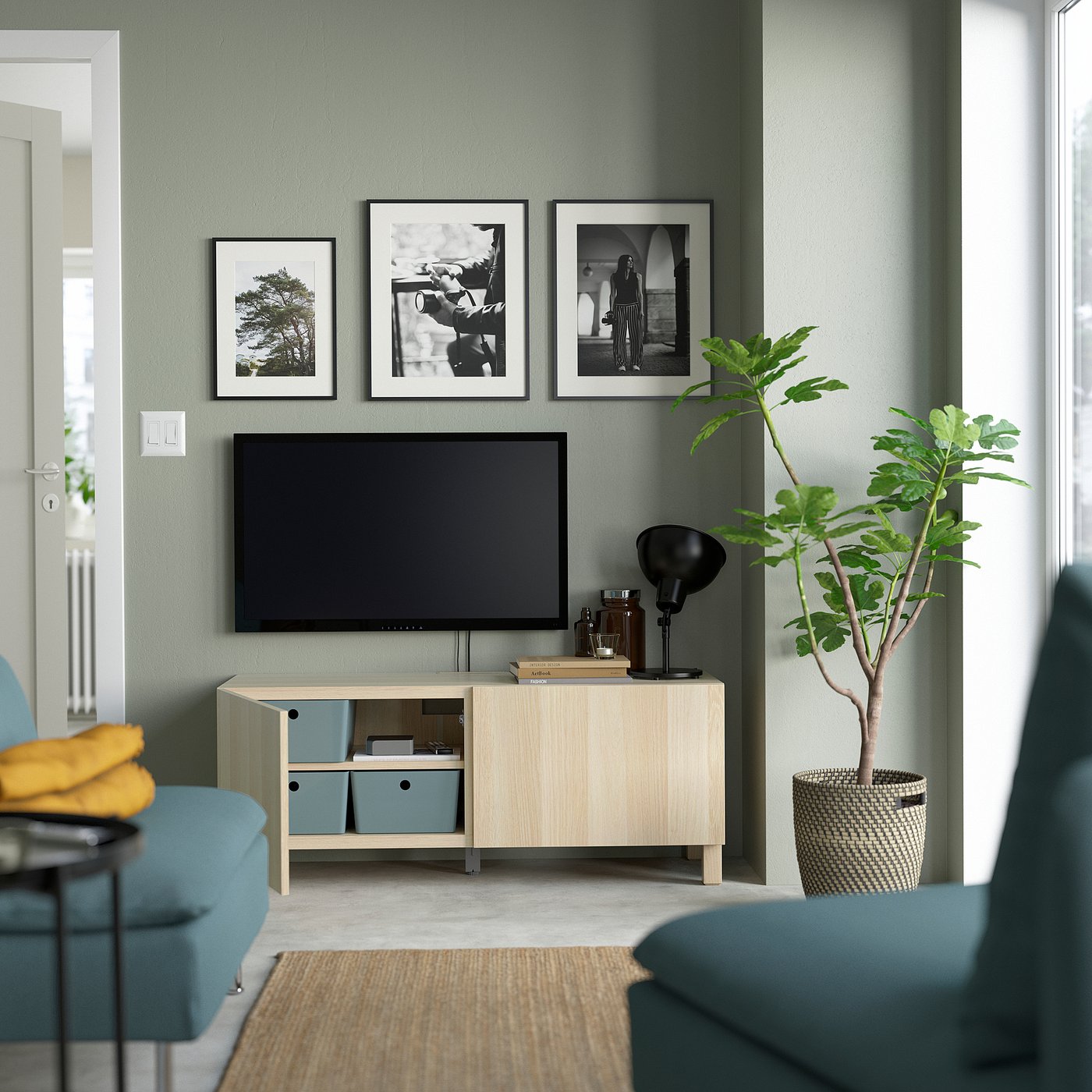 Modern living room with grey walls, BESTÅ tv stand, flat-screen tv, and decor.