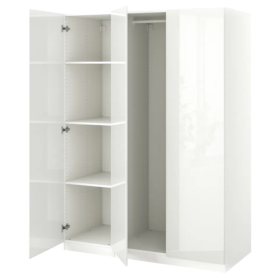 White PAX wardrobe with open mirrored doors, four empty shelves.