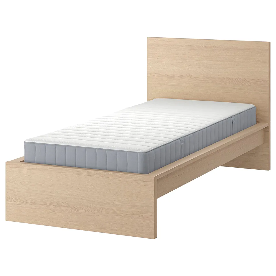 Light wood MALM bed with blue mattress, slim & modern design.