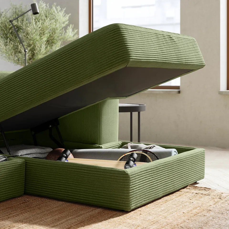 Green JÄTTEBO sofa with storage, modern design.