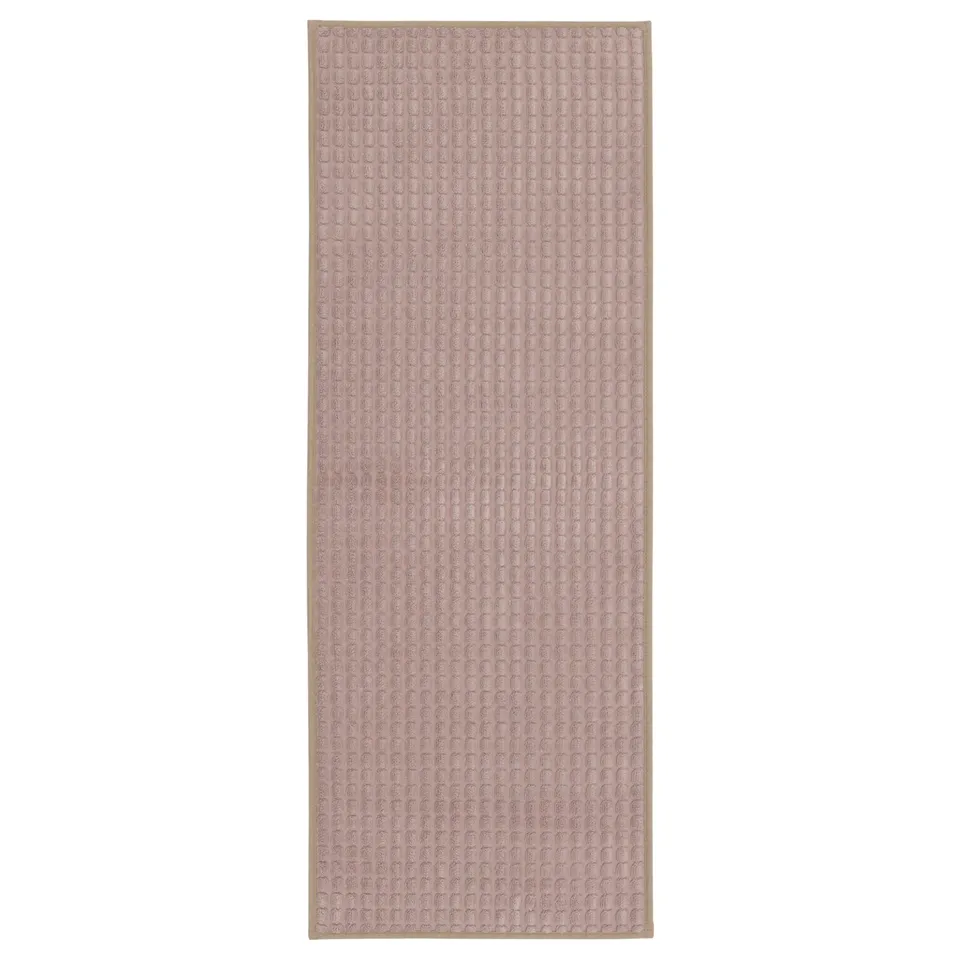 A beige BRYNDUM kitchen mat with a textured surface and anti-slip backing.