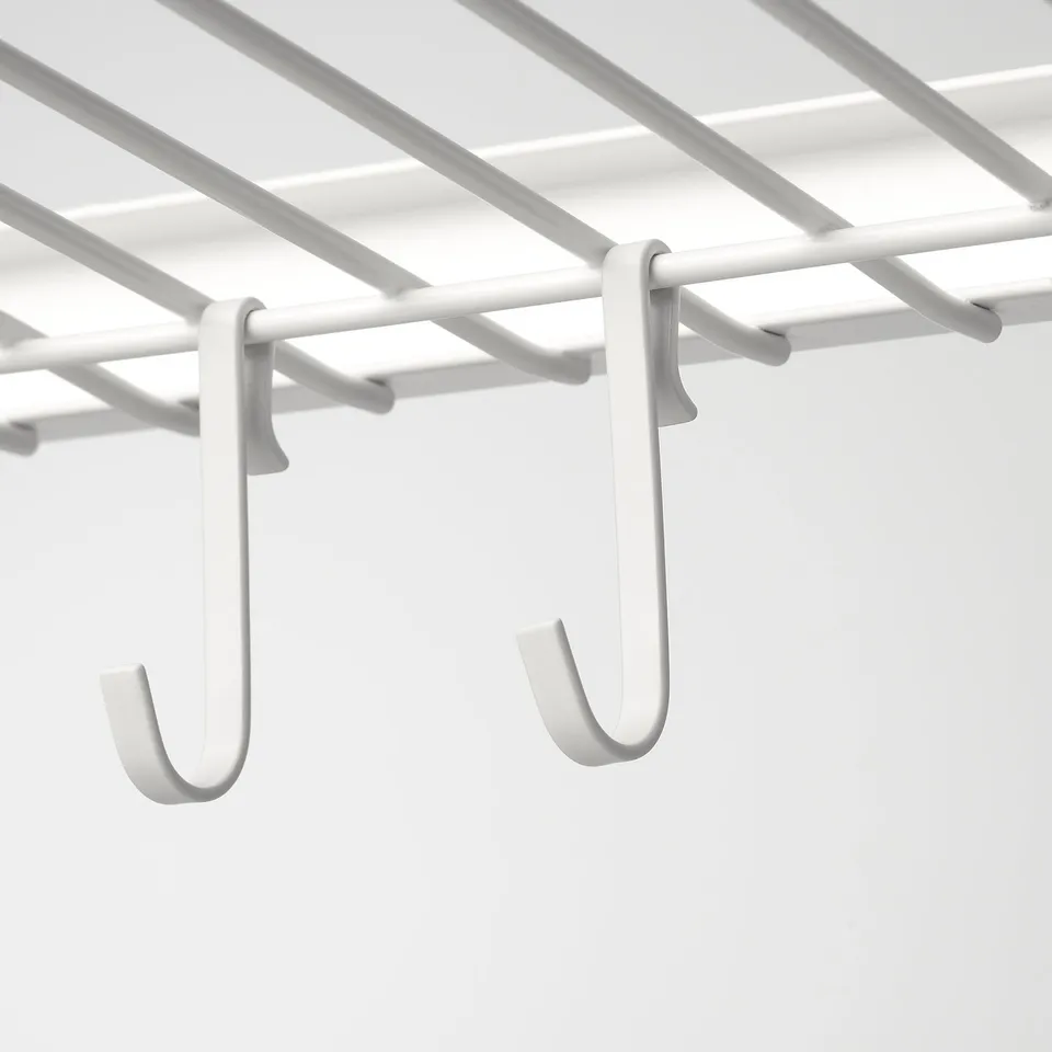 White wire shelf with j-hooks for organising items, durable construction.