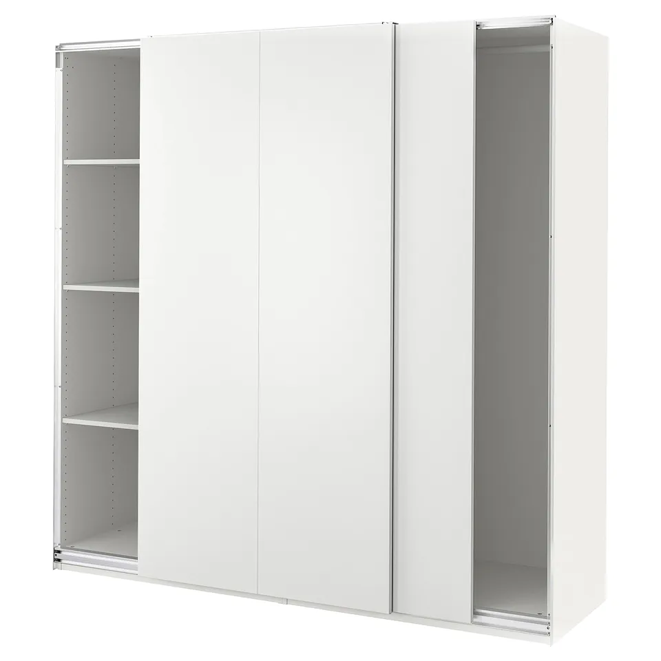 White PAX wardrobe with sliding doors, minimalist design, adjustable shelves.