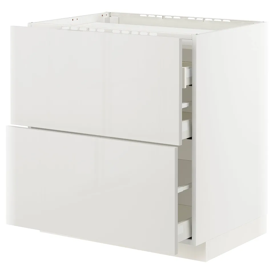 White METOD kitchen cabinet with smooth grey drawers and glossy finish.