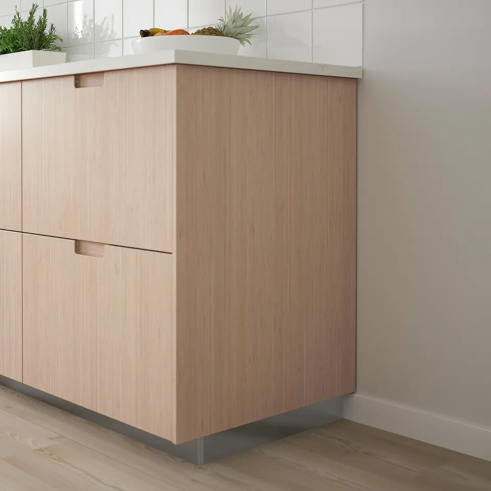 Natural bamboo kitchen cabinet with modern, minimalist design.