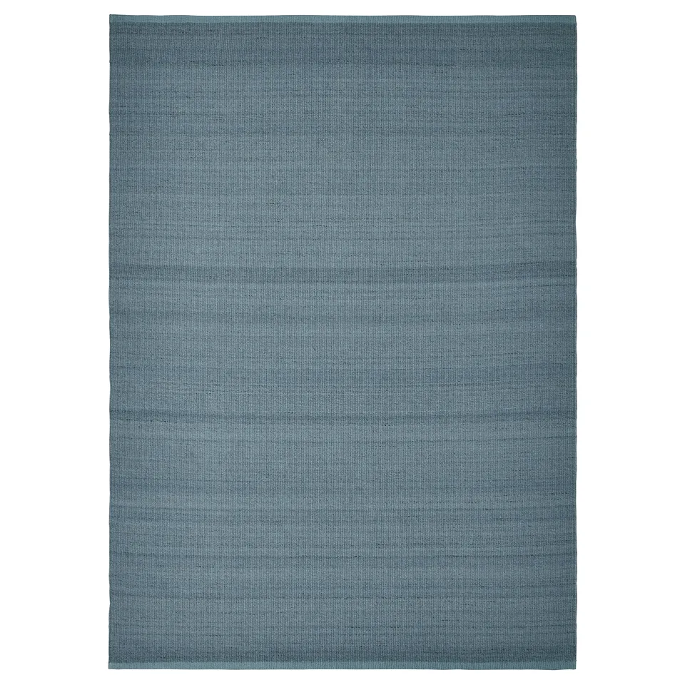 Flatwoven grey-blue rug, rectangular, simple weave, cotton and wool blend.