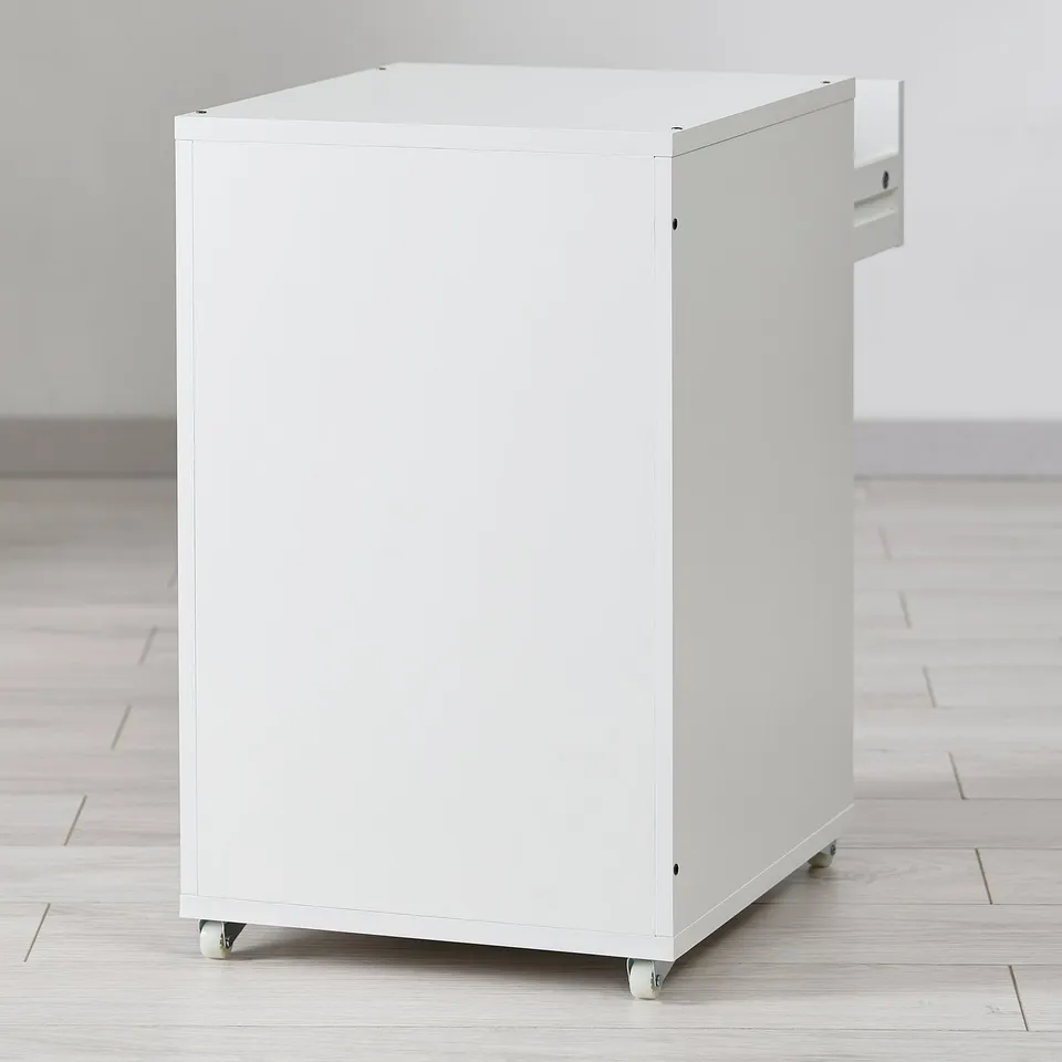 White mobile storage unit on wheels, with four drawers for organised storage.