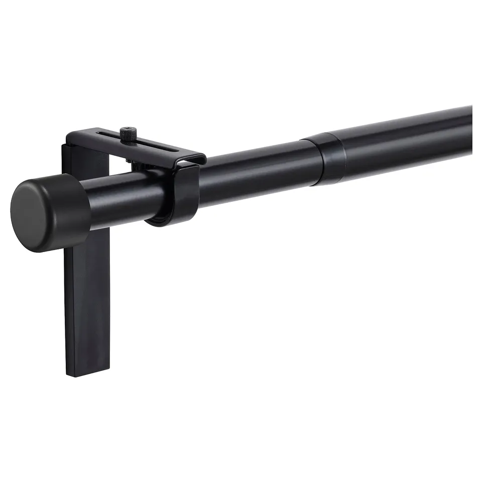 Black HUGAD curtain rod set, extendable, modern design, includes 4 brackets.