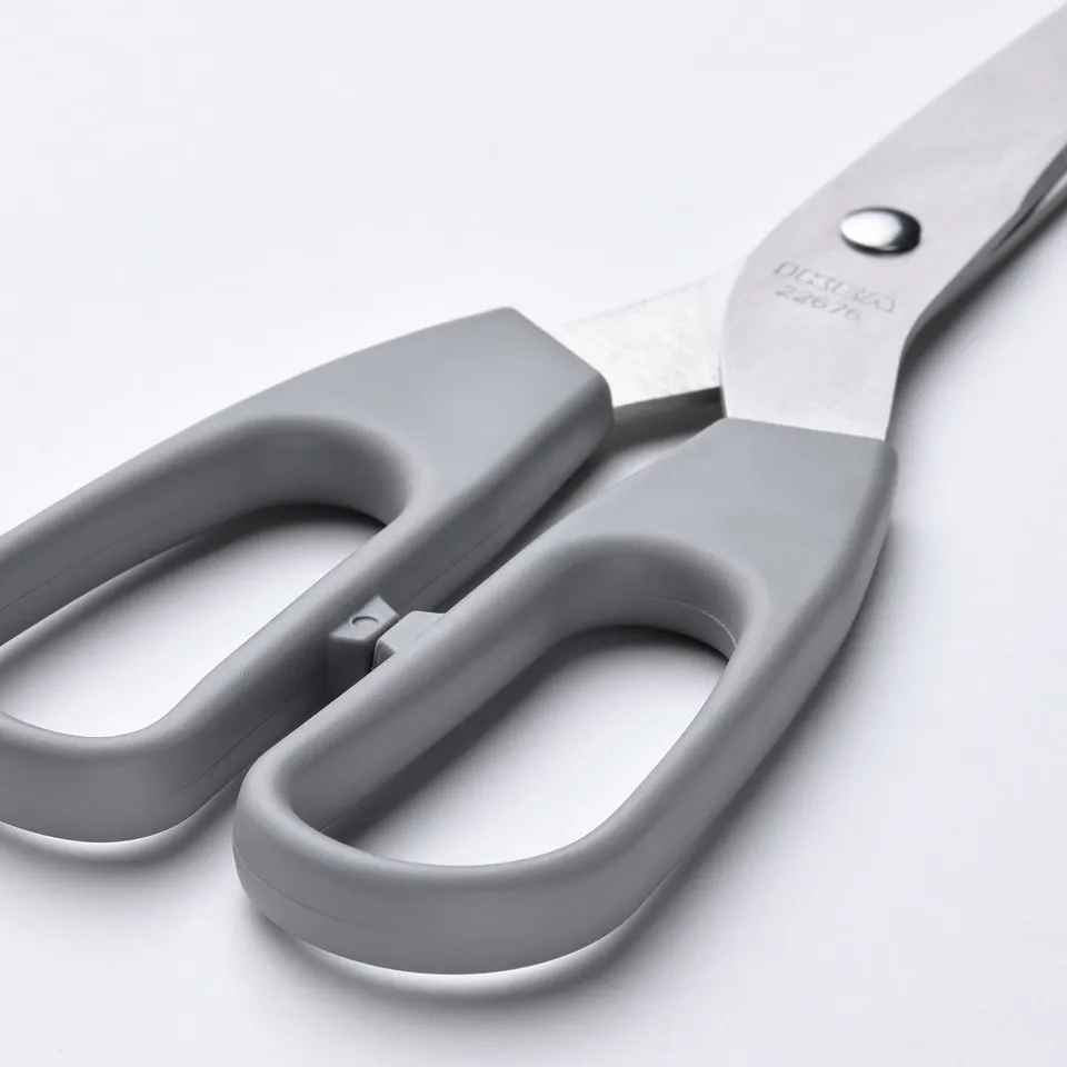 Modern grey scissors with stainless steel blades and ergonomic handles, designed for both right and left-handed users.