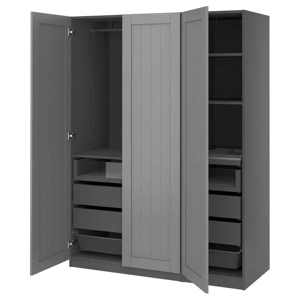 An open grey PAX wardrobe with drawers and shelves.