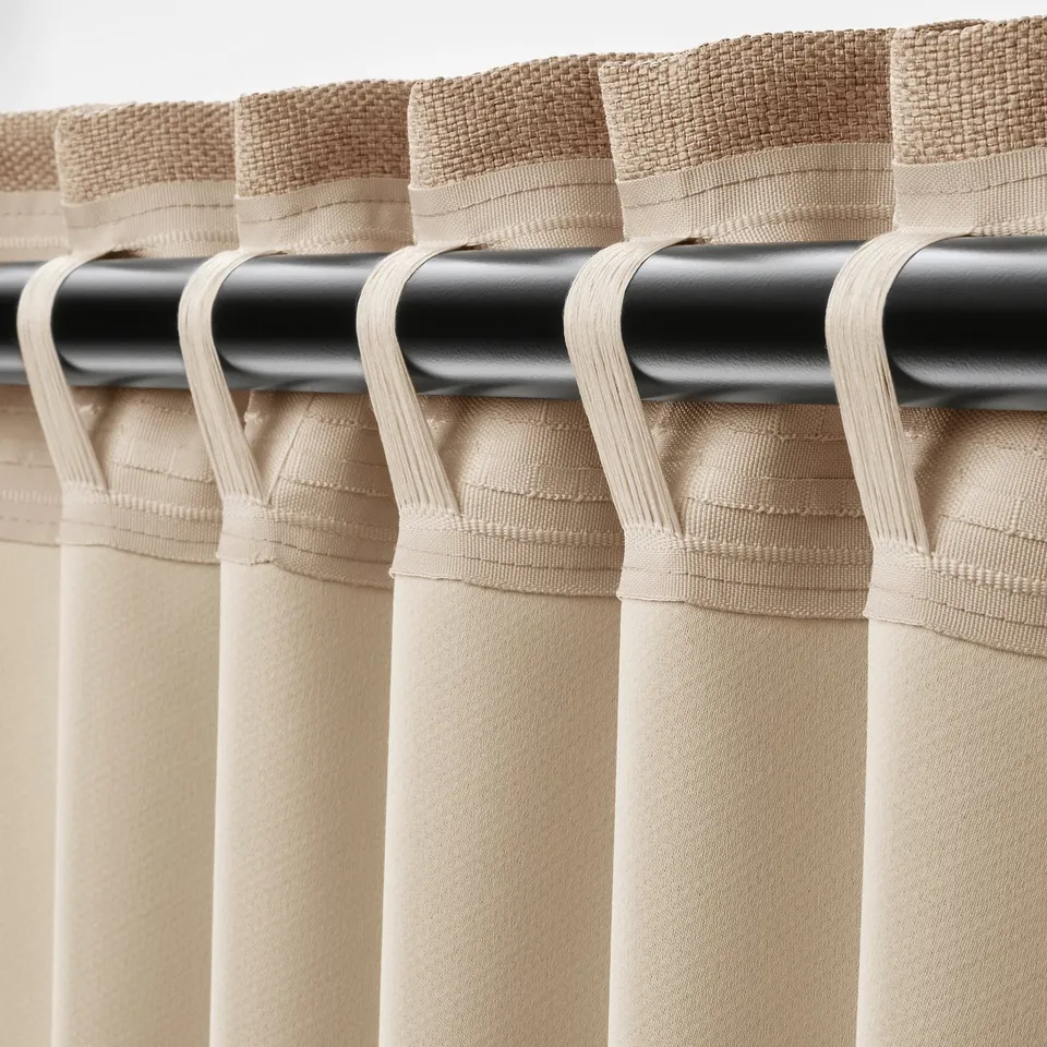 Four beige curtains are shown, each with a rod pocket top for hanging, designed for room darkening and privacy.