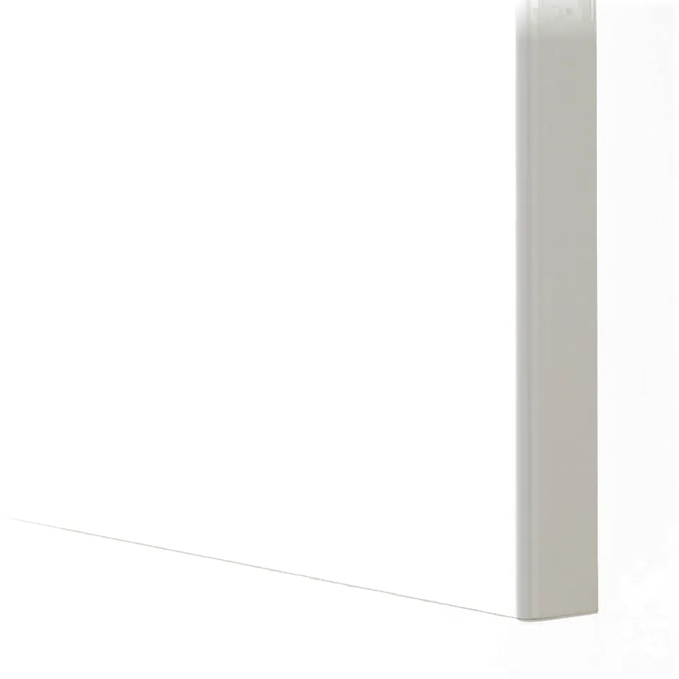 Close-up of modern white glossy kitchen cabinet corner. Smooth surface and sleek design.