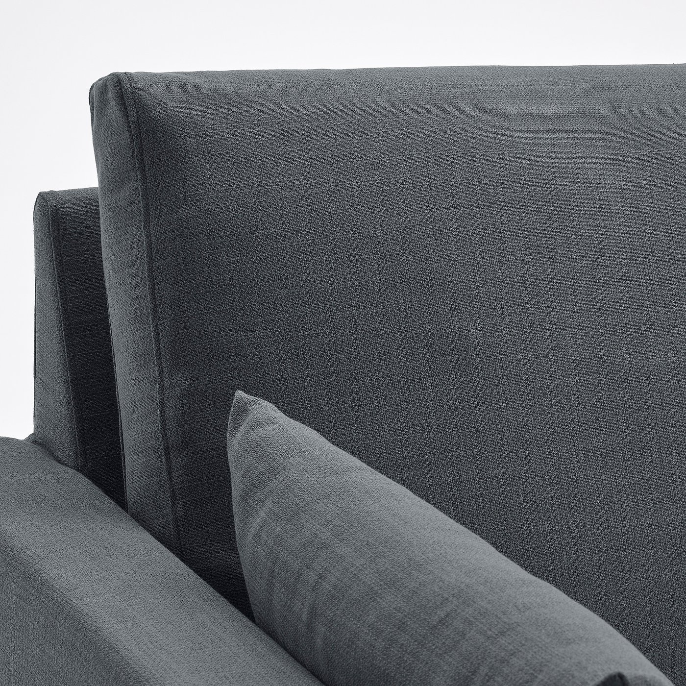 A modern grey sofa showcasing quality upholstery and clean design. It plush cushions and a sleek, inviting appearance.