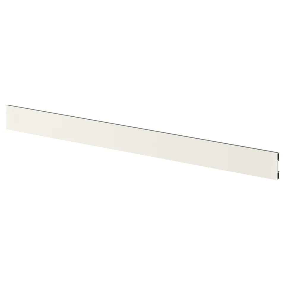 A white FÖRBÄTTRA kitchen plinth. Its long, rectangular, and made of plastic.