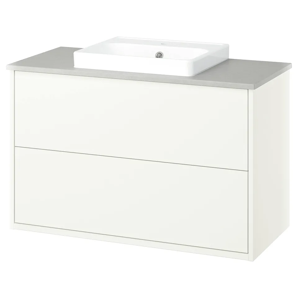 HAVBÄCK white bathroom vanity, sleek, modern design, with two drawers, a semi-recessed sink, and light grey countertop.