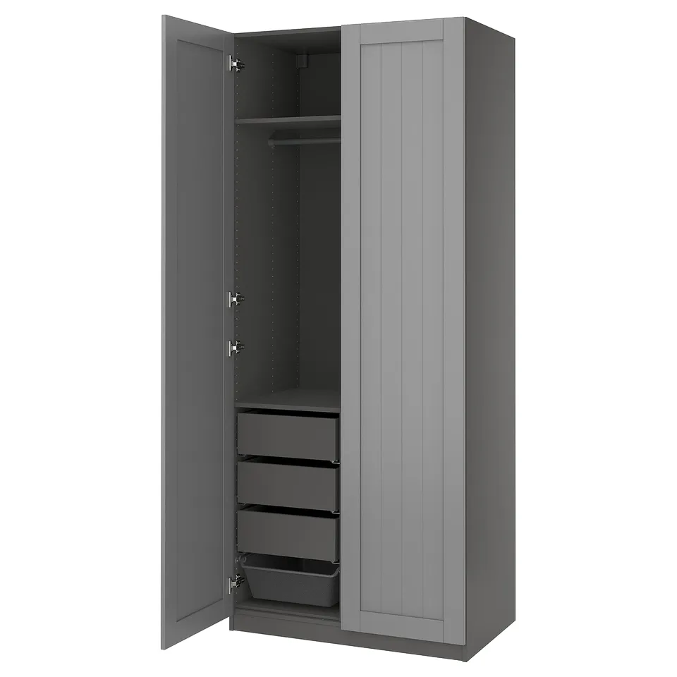 An open PAX wardrobe in grey. It drawers, a shelf, and a hanging rod, highlighting its storage versatility.