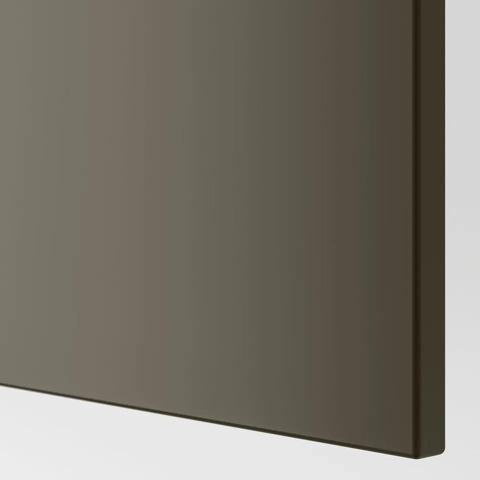 Modern kitchen cabinet, sleek dark finish, rounded edges.