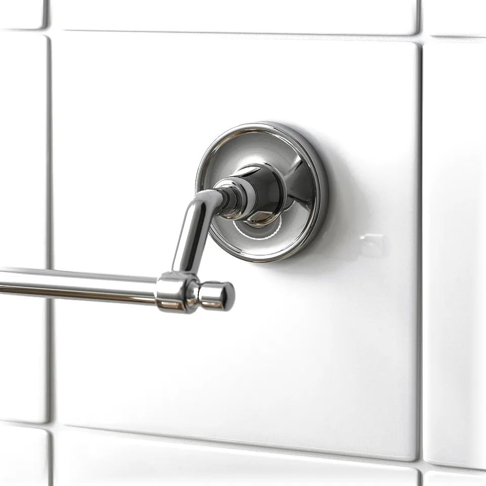 Modern chrome towel bar mounted on white tiles. Elegant design with polished finish.