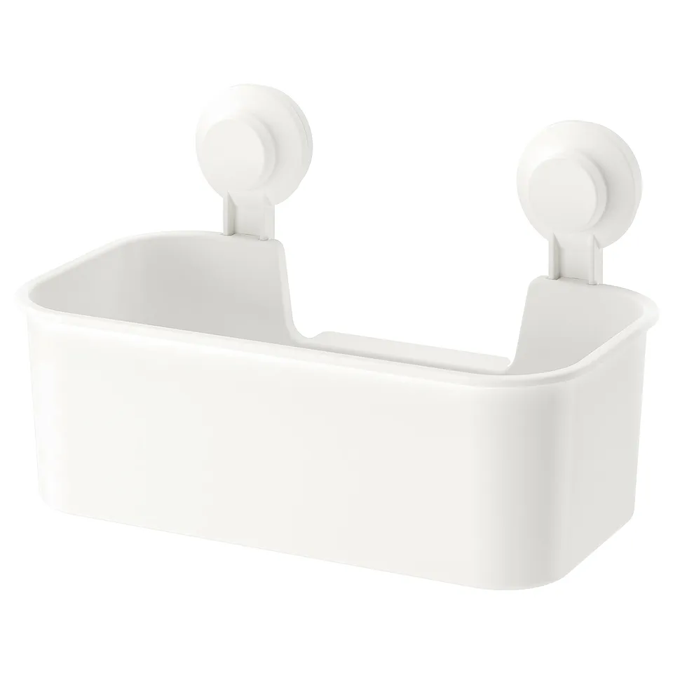 A white TISKEN wall-mounted storage basket with suction cups. Its rectangular shape is ideal for organising toiletries or small items.