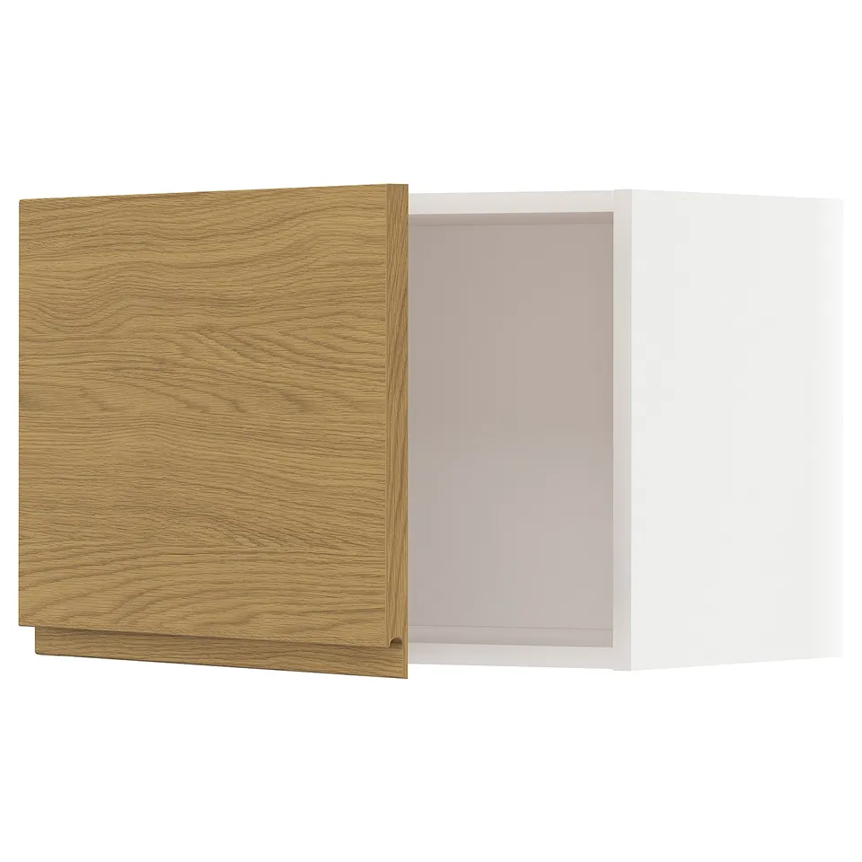 A wooden drawer from the METOD kitchen system, featuring light oak material.
