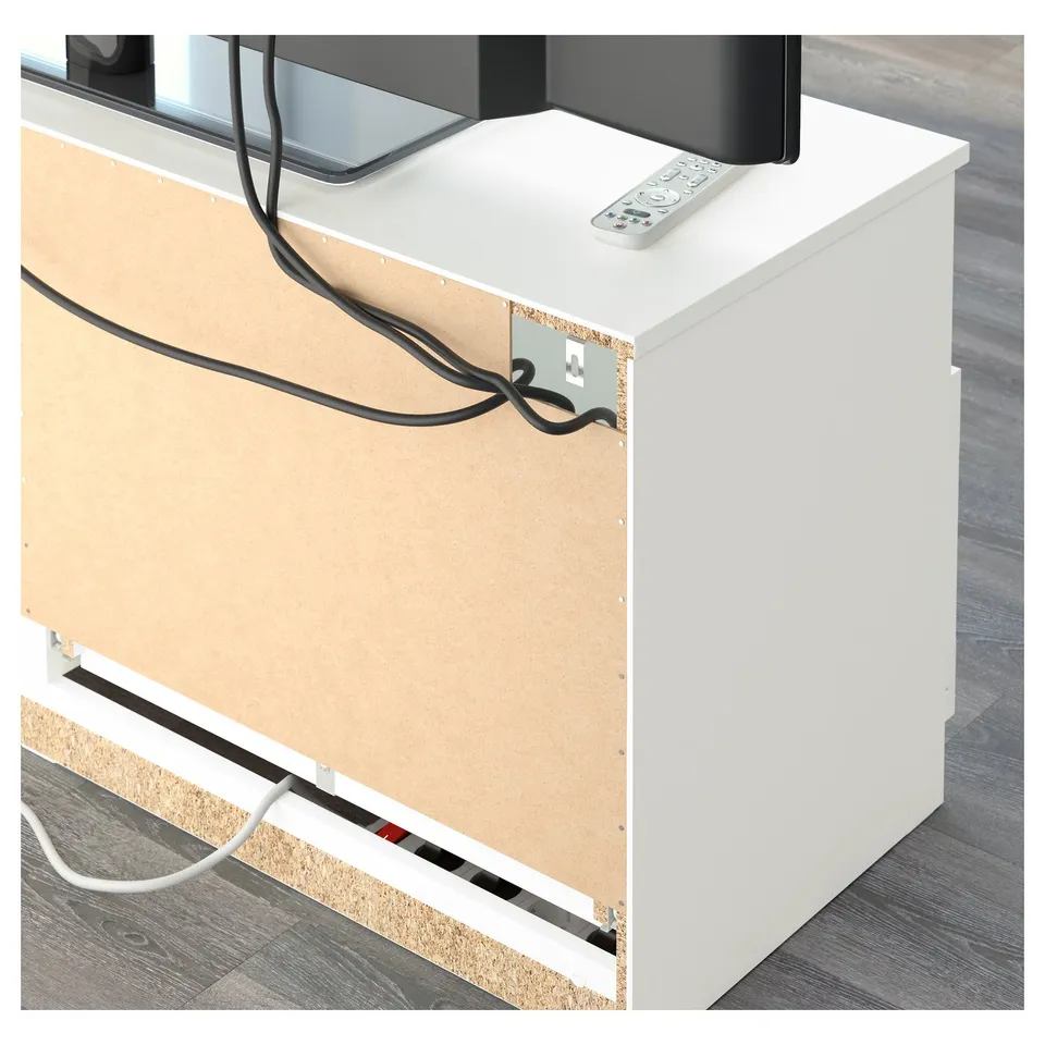 A tv bench with cable management. It has side cable outlets and a drawer for storing tv accessories.