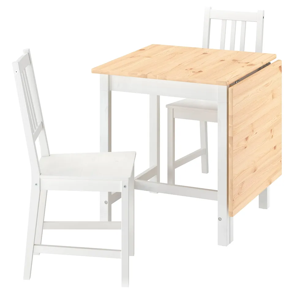 White wooden dining set. Small square table and two chairs. Table has light wood top and folds down.