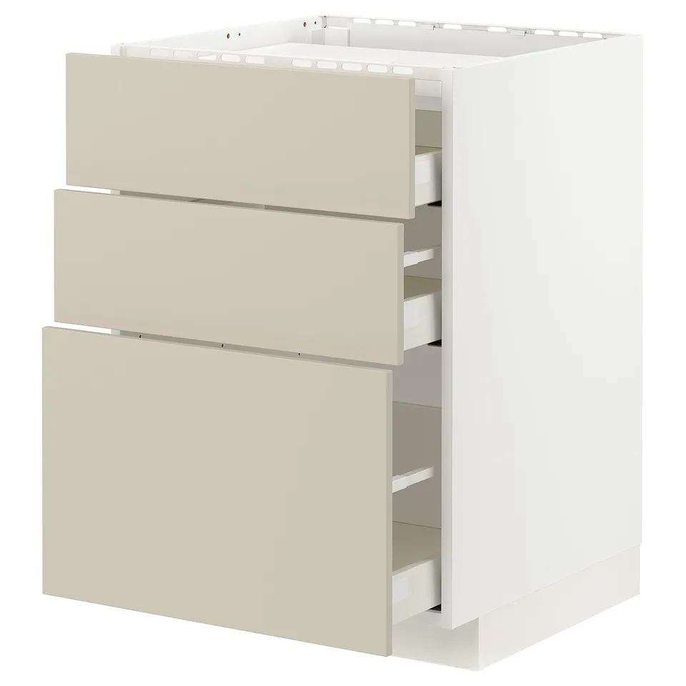 A white METOD kitchen cabinet with beige drawers. It has three drawers with a smooth, modern design.