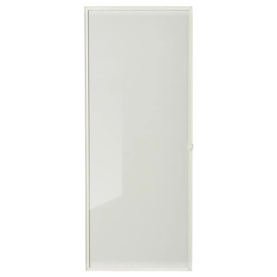 A white HÖGBO glass door for a bookcase, featuring a sleek frame and clear glass panel, designed for personalization.