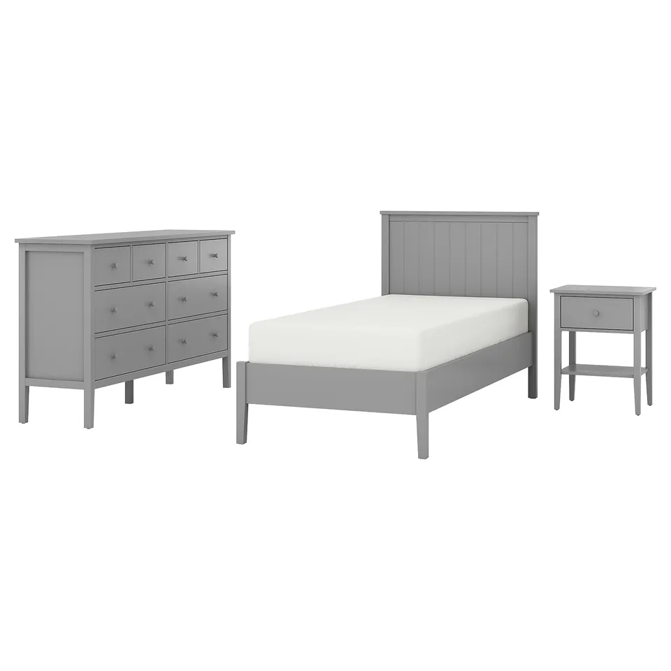 A grey GULLABERG bedroom set. It includes a bed, bedside table, and dresser, all with a modern, minimalist design in solid wood and particleboard.