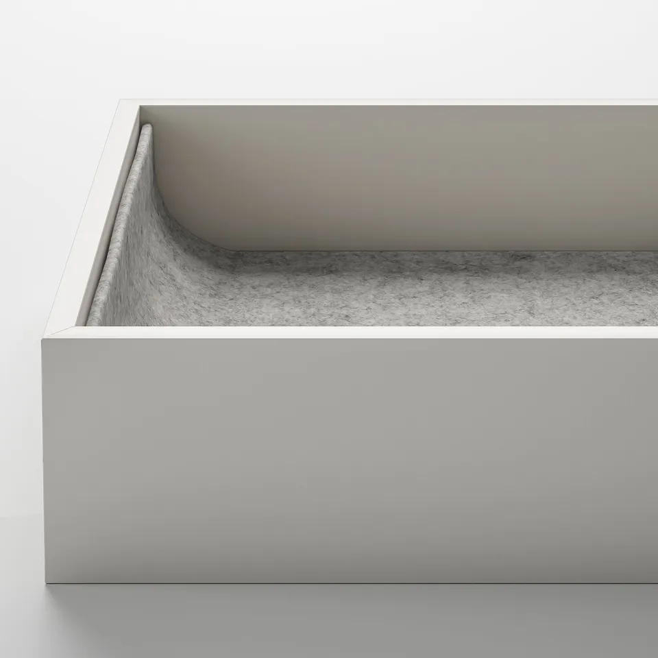 Modern, minimalist box with textured bottom, showcasing sleek design and high-quality materials.