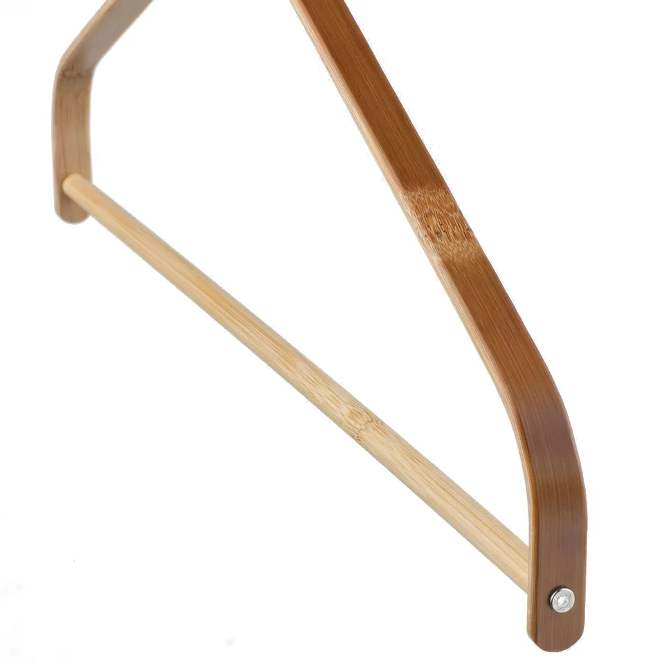 Wooden hanger with curved shape, smooth finish, and metal fastener. Suitable for hanging clothes neatly.