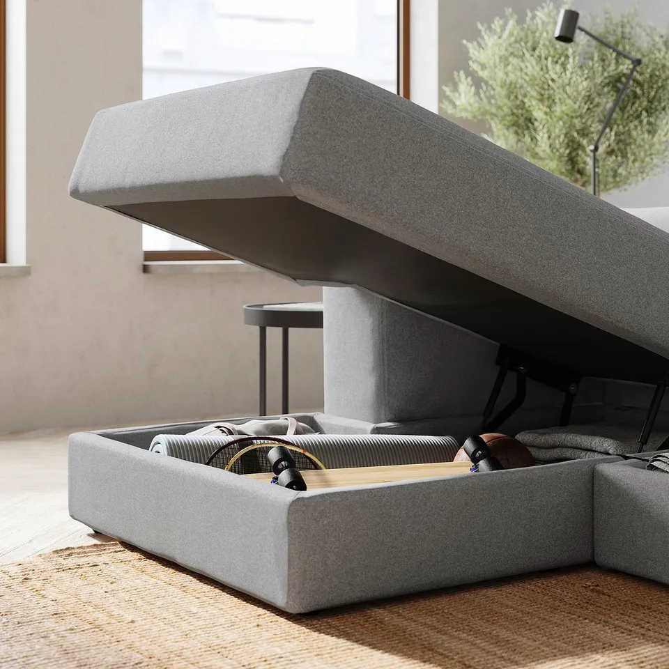 Grey JÄTTEBO modular sofa with open storage, soft cushions, clean lines.