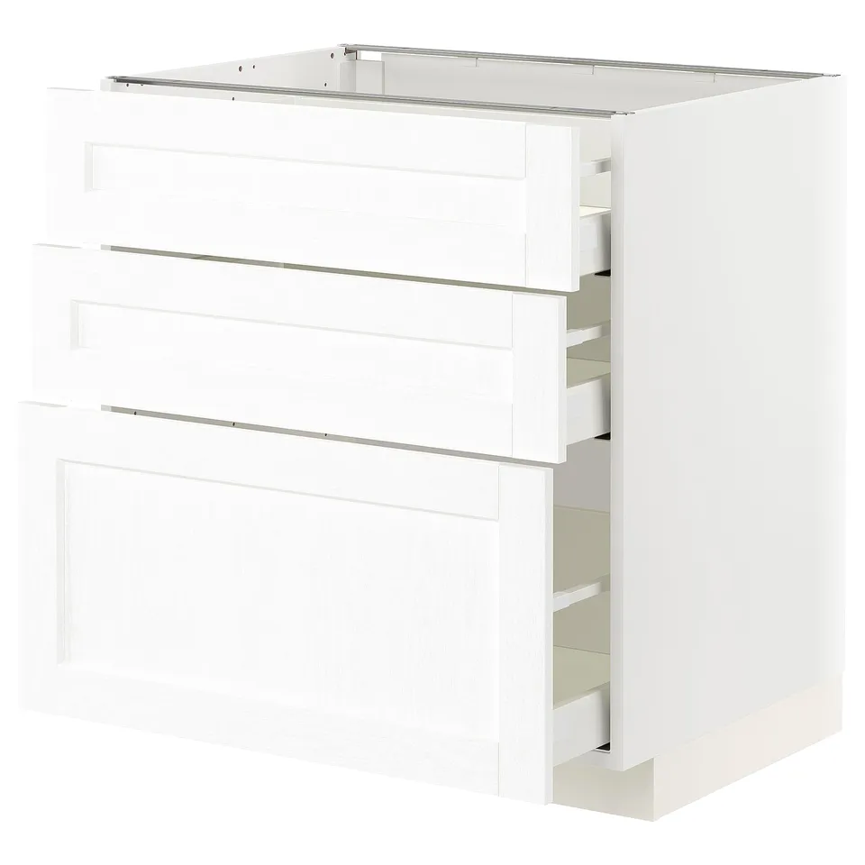 White kitchen cabinet with pull-out drawers.