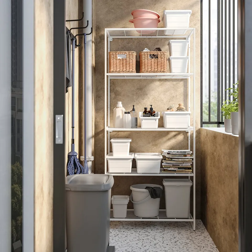Organised storage unit with bins, white steel frame, near window.
